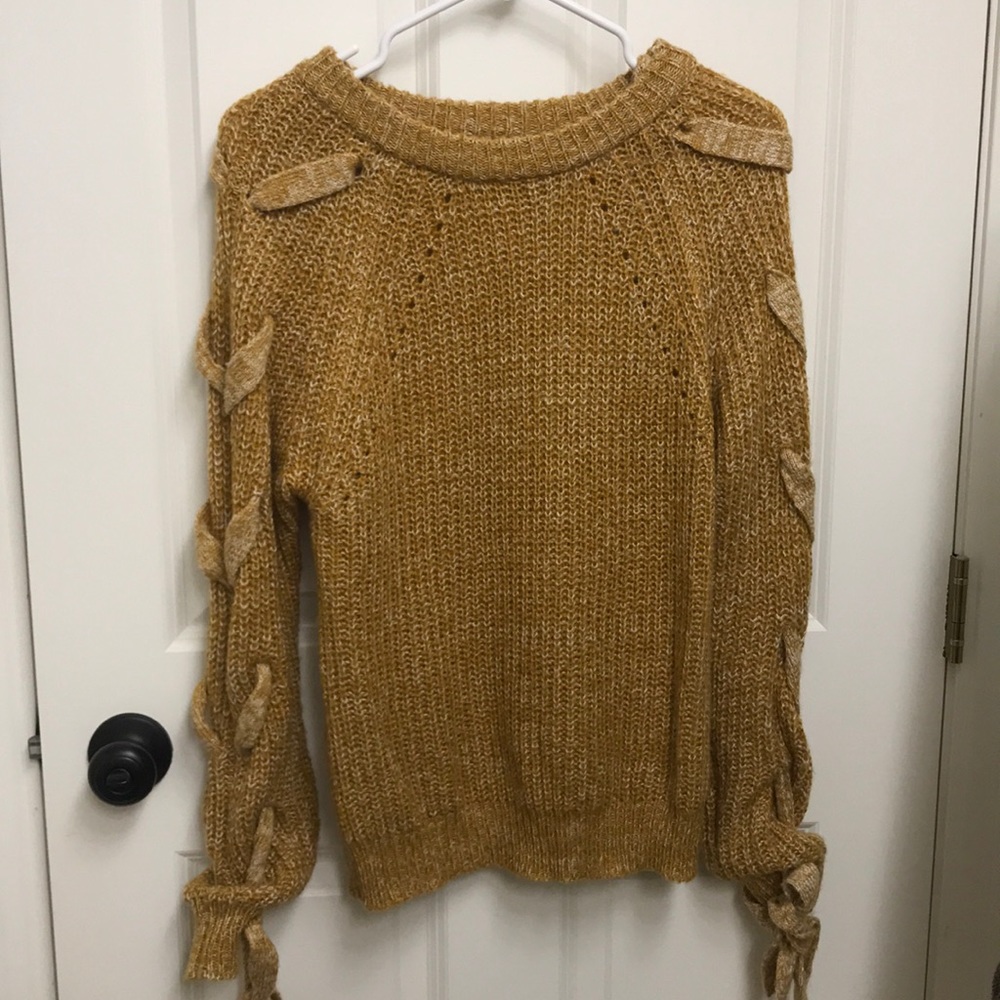 Boutique Mustard sweater with arm detail.